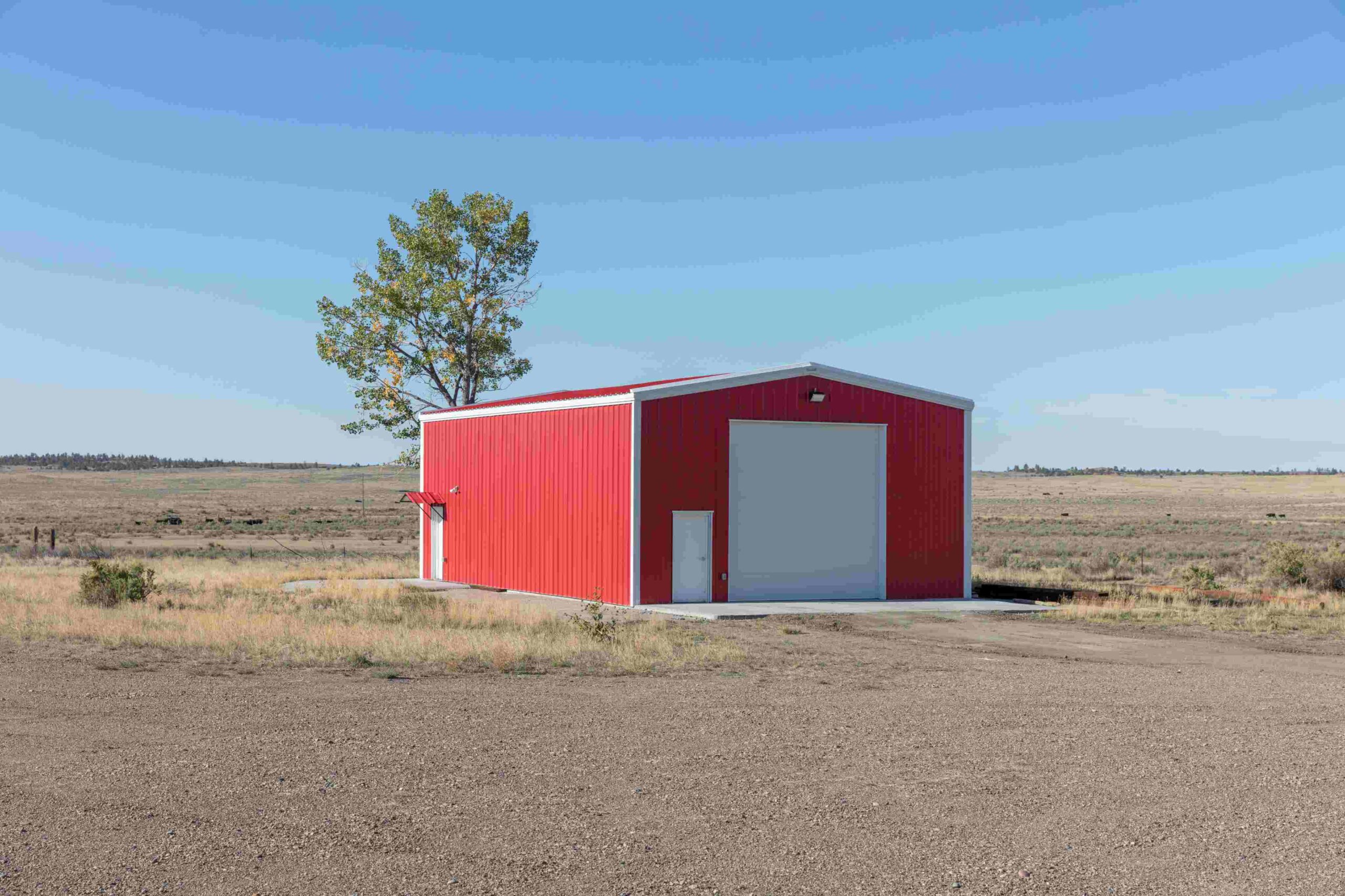 red-building-with-a-grey-garage-door-on-plains-2026-03-25-01-18-52-utc