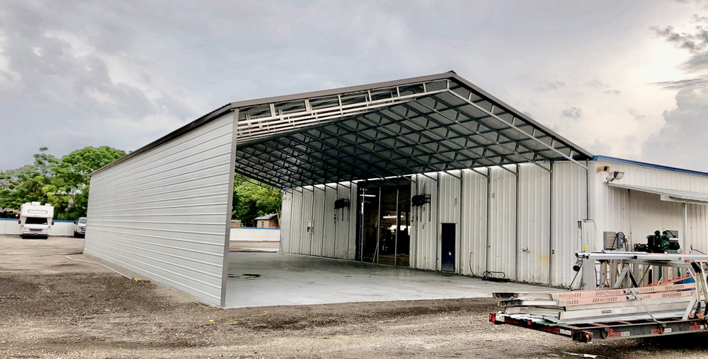 Large open metal structure with roof