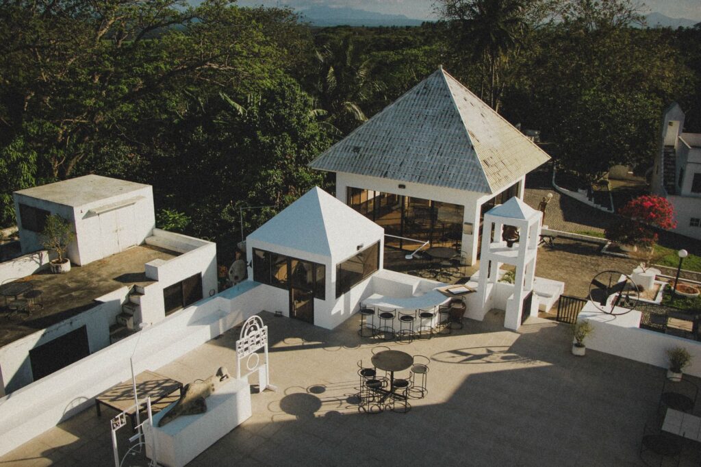 custom outdoor pavilions with metal roof attached to a Florida backyard patio