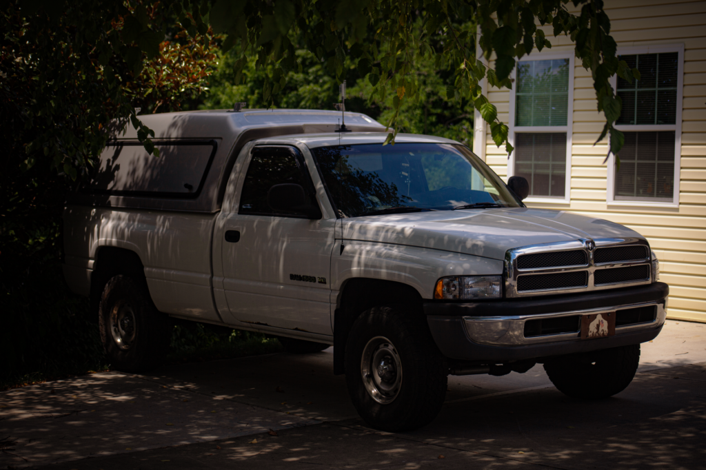 Best Car Canopy Options for Protecting Your Vehicle in 2026 1 car canopy protecting a pickup truck from sun and rain in a Florida driveway