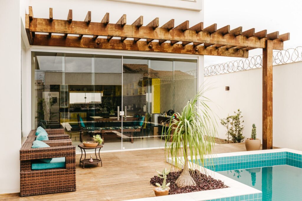 Why Homeowners in Ocala and Orlando Choose Modern Pergolas for Backyard Shade 2 close-up of pergolas with louvers in the open position over a Florida patio