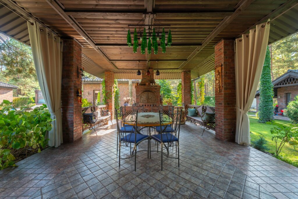 outdoor furniture near me protected by a backyard pavilion roof
