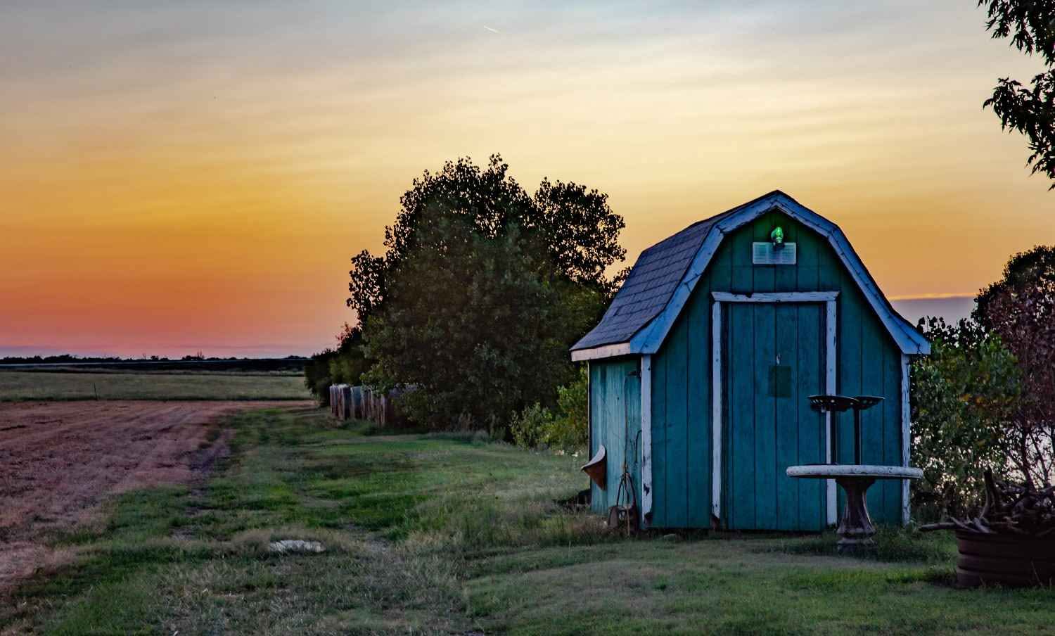 rural-landscape-with-shed-at-sunset-2026-03-15-23-22-32-utc
