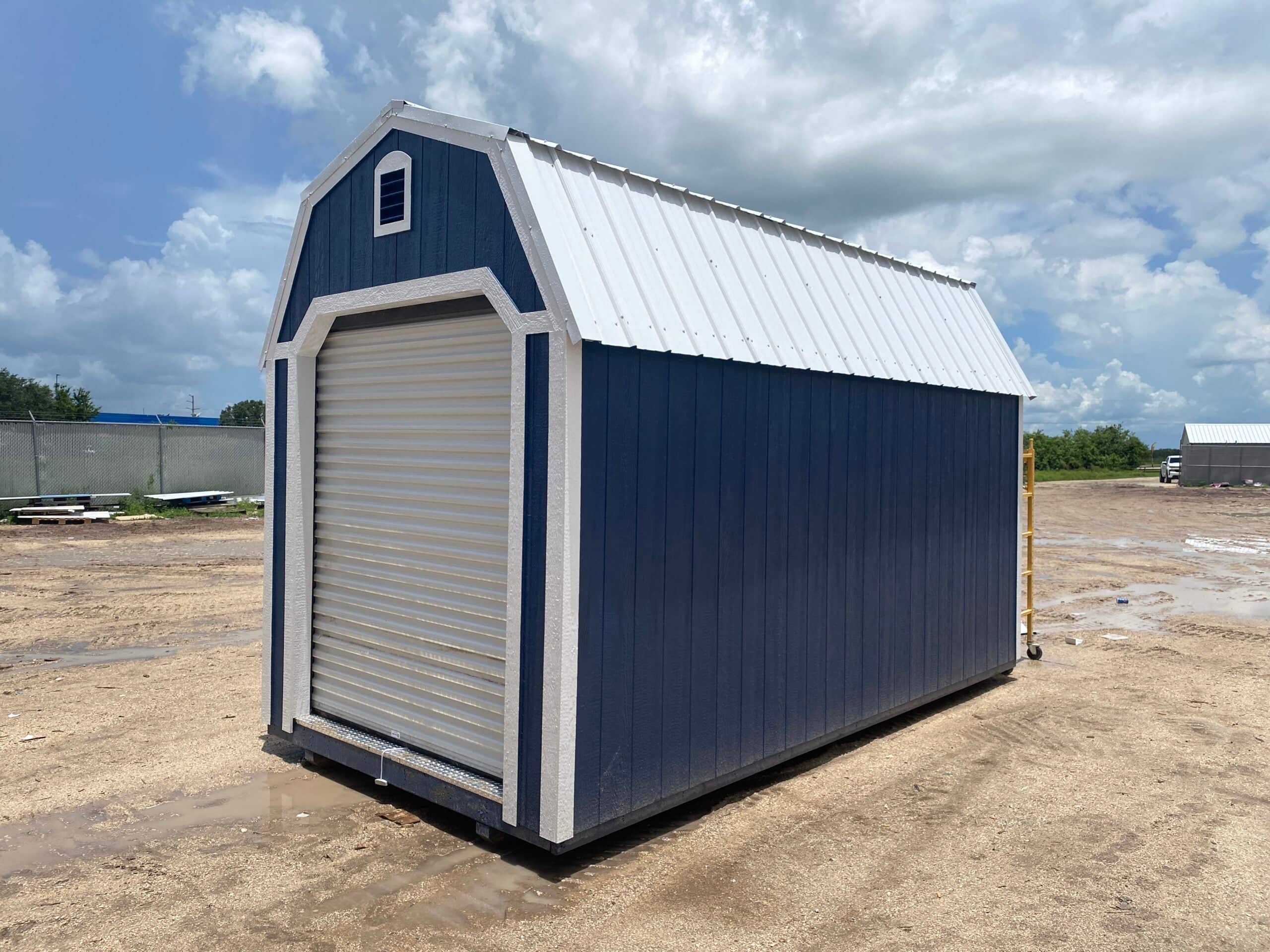 Blue shed with white trim