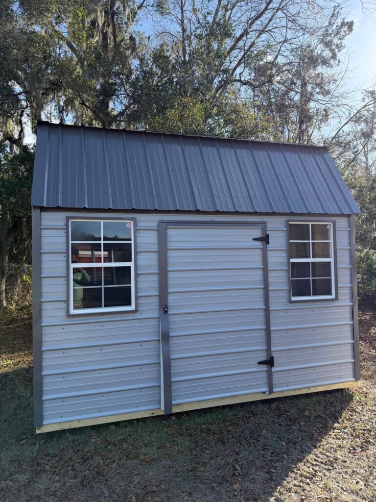 Metal storage shed in natural setting